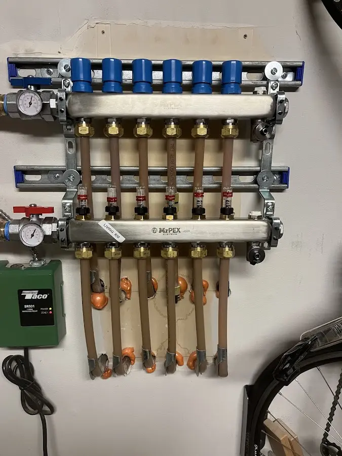 Plumber performing Gas Line Installation at a residential property in Millburn